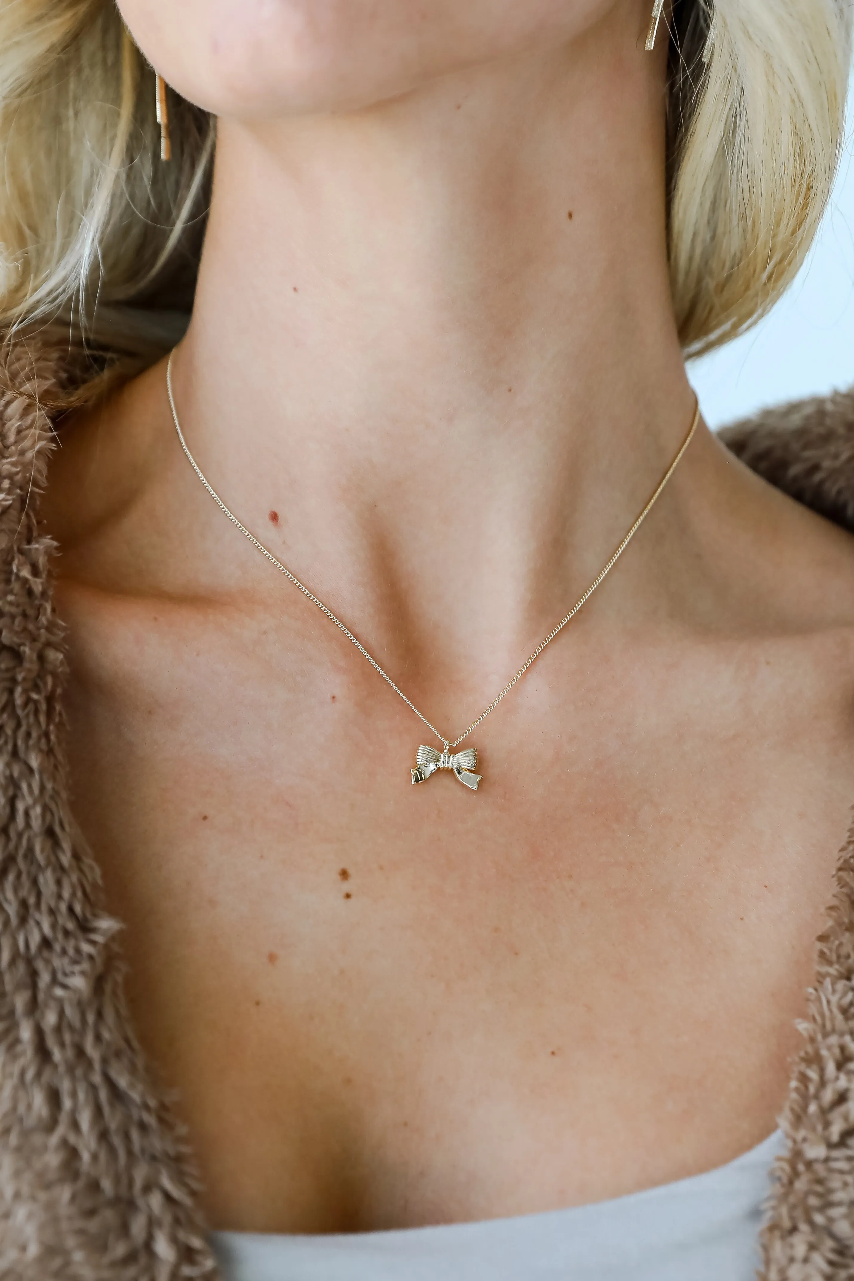 Gemma Gold Bow Charm Necklace